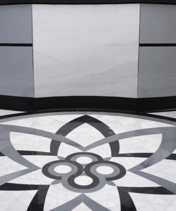 Recepción · rosetón en Negro Marquina